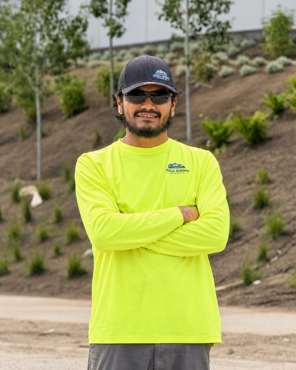 Mario, senior foreman at Mega Siding Exterior Ltd., on a job site in British Columbia